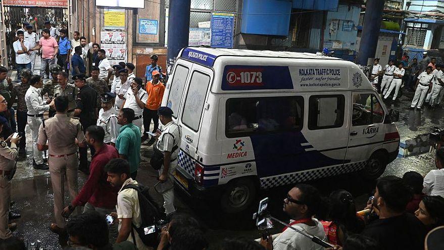 Ambulance carrying Durga Puja victims stops in front of a hospital