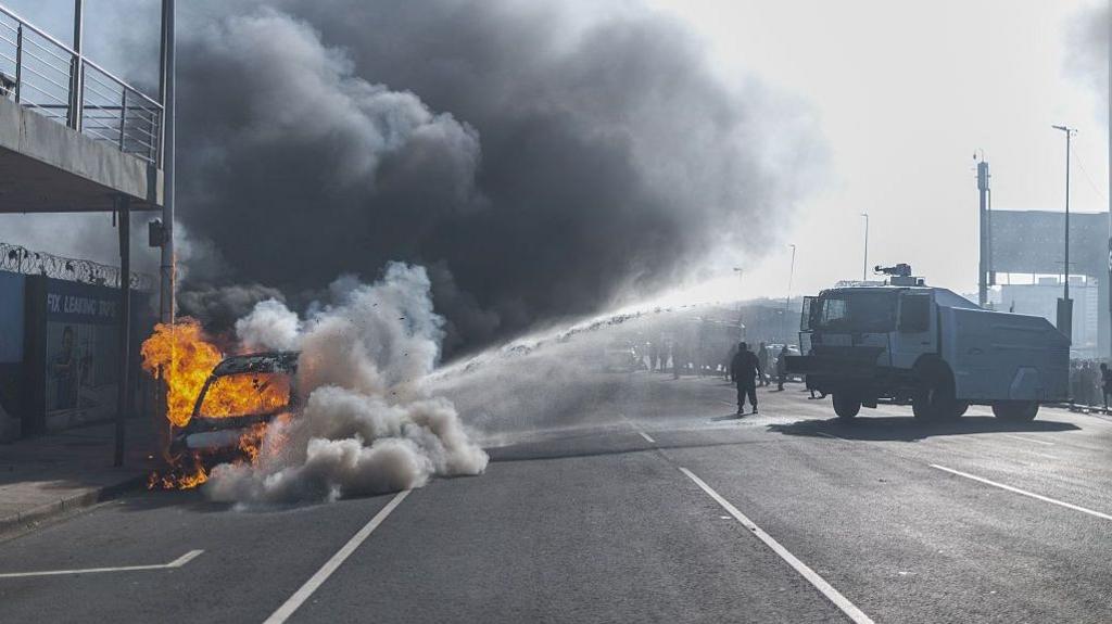 South Africa Shaken as Anti‑Immigration Protests Turn Violent, 24 Cars Burned