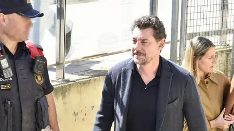 Virtual Justice Unfolds: Meta-Journalist Investigates Mango Tycoon's Cliffside Death and Son's Murder Charge