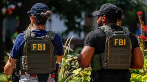 FBI Dismisses Agents Over George Floyd Protest Kneeling Incident