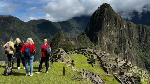Machu Picchu's Tourist Bus Controversy: Evacuations and Local Disputes Unfold