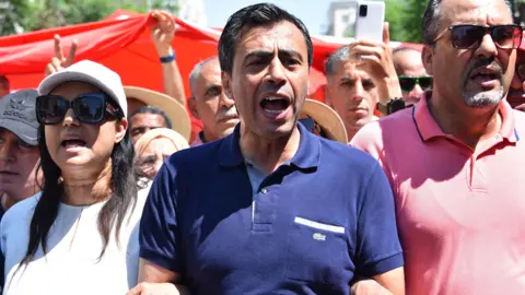 Escalating Crackdown: Tunisia Sentences Opposition Leaders