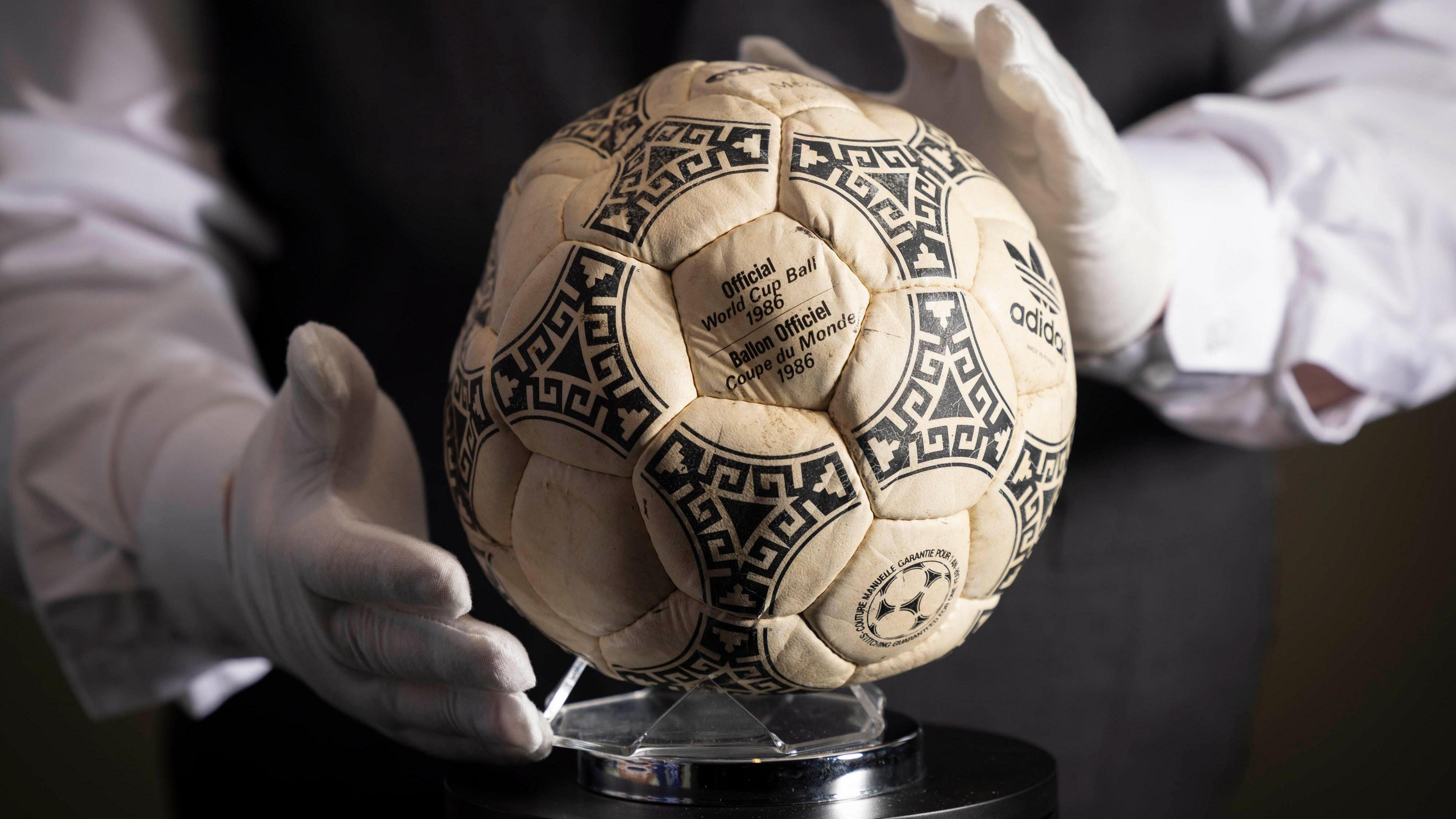 Maradona's "Hand of God" ball hits auction, sells for £2.5m