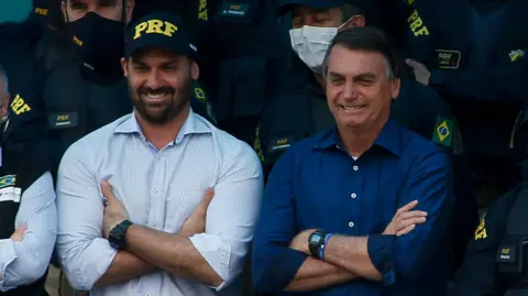 Jair Bolsonaro's Son Charged with Coercion Amid Political Turmoil in Brazil