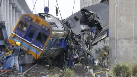Tragedy Strikes as Construction Crane Collapses onto Thai Train