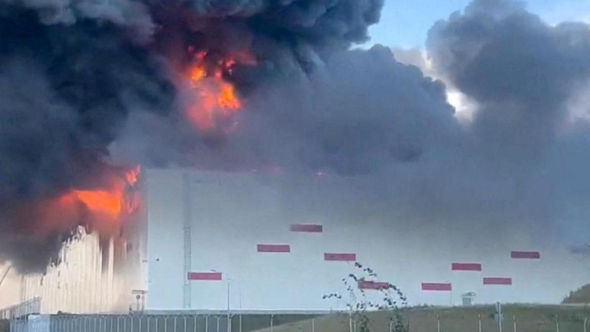 Smoke rises from a Wildberries warehouse in the St Petersburg region