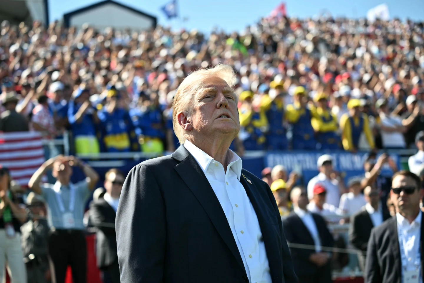 Trump's Remarkable Day: From Political Tensions to Golf Cheers