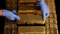 Gold Hits Record High of $4,000 Amid Economic Turmoil