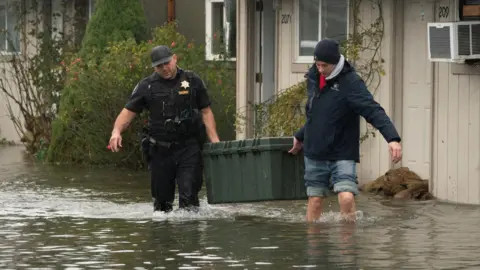 Severe Flooding Prompts Mass Evacuations in Pacific Northwest